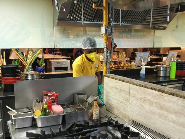 Gel baiting around a hotel kitchen cooking range