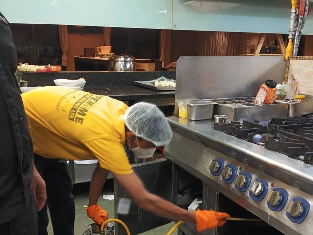 Treatment in a commercial restaurant kitchen